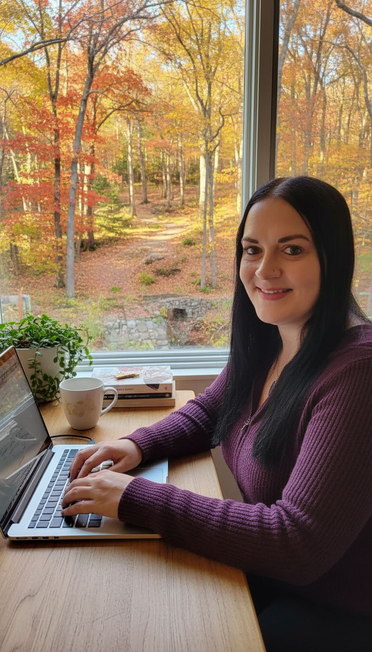 Jessica Grace Coleman at her desk